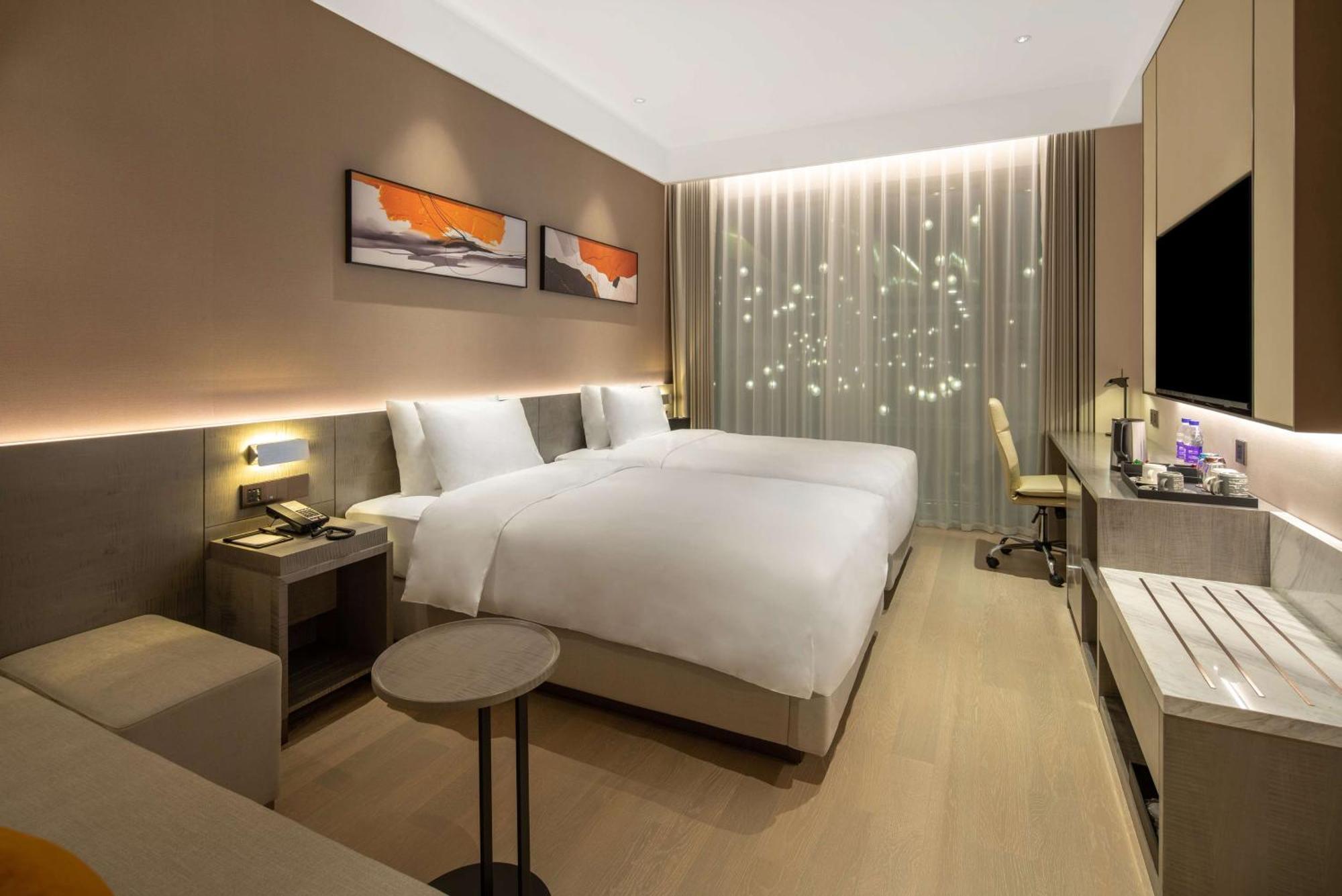 Отель Hyatt Place Linyi People Square Экстерьер фото