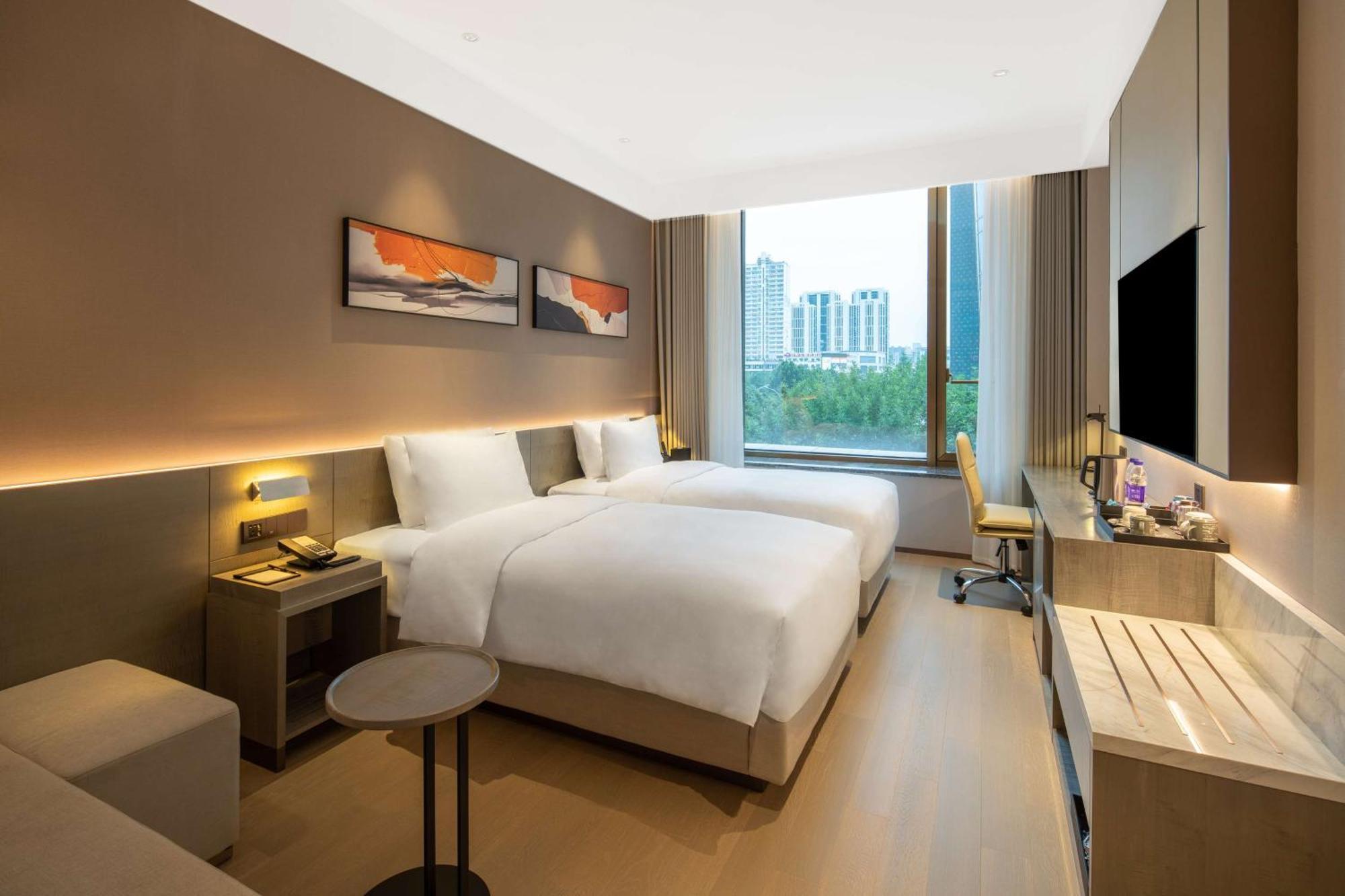 Отель Hyatt Place Linyi People Square Экстерьер фото